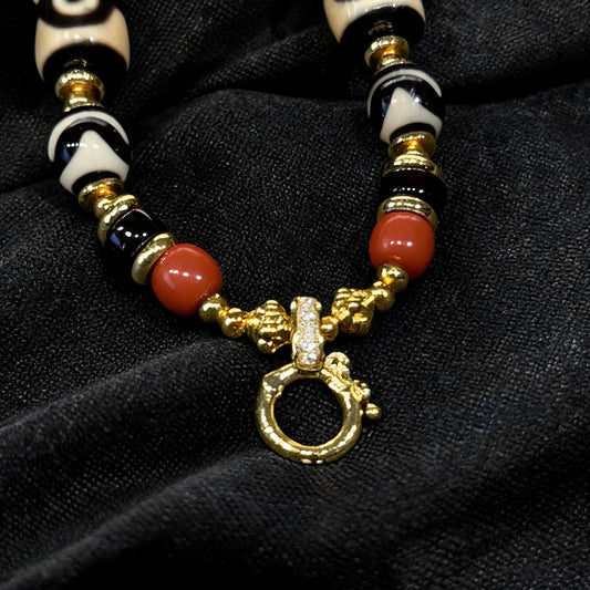 Design N dzi bead pendant detail close-up