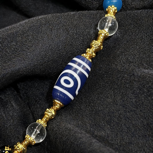 Design H dzi bead pendant detail close-up
