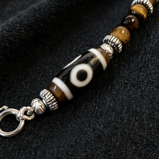 Design A dzi bead pendant detail close-up