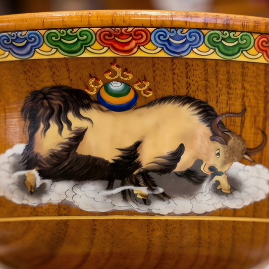 Yak motif wood bowl side view