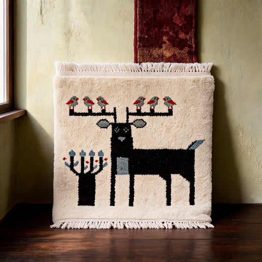 White Black Deer Motif Mini Tibetan Rug three-quarter view