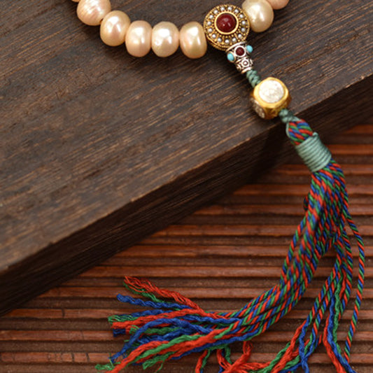 Handcrafted Champagne Pearl Bracelet with Tassel - pendant and pearl detail