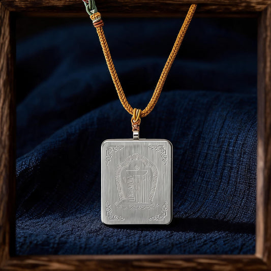 Yellow Jambhala thangka pendant necklace side view