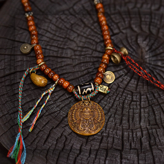 Collector grade Tibetan yak bone 108 mala with Dzi bead necklace and pendant detail