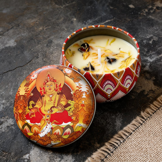 Yellow Jambhala Freesia Thangka Candle — overhead still-life view