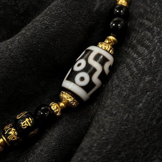 Design K dzi bead pendant detail close-up