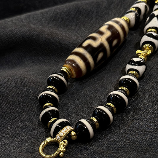 Design S dzi bead pendant detail close-up