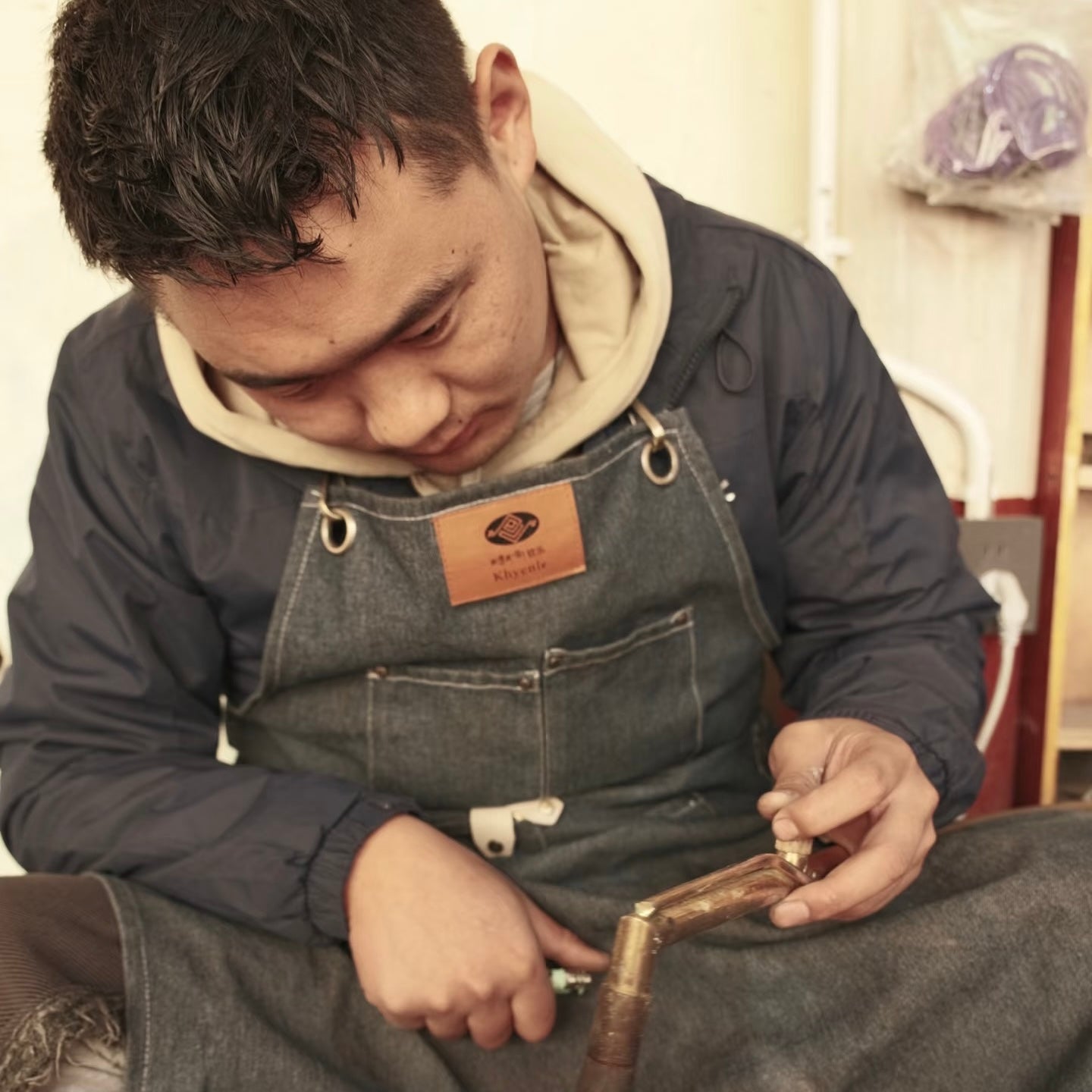 Artisan shaping a handcrafted object
