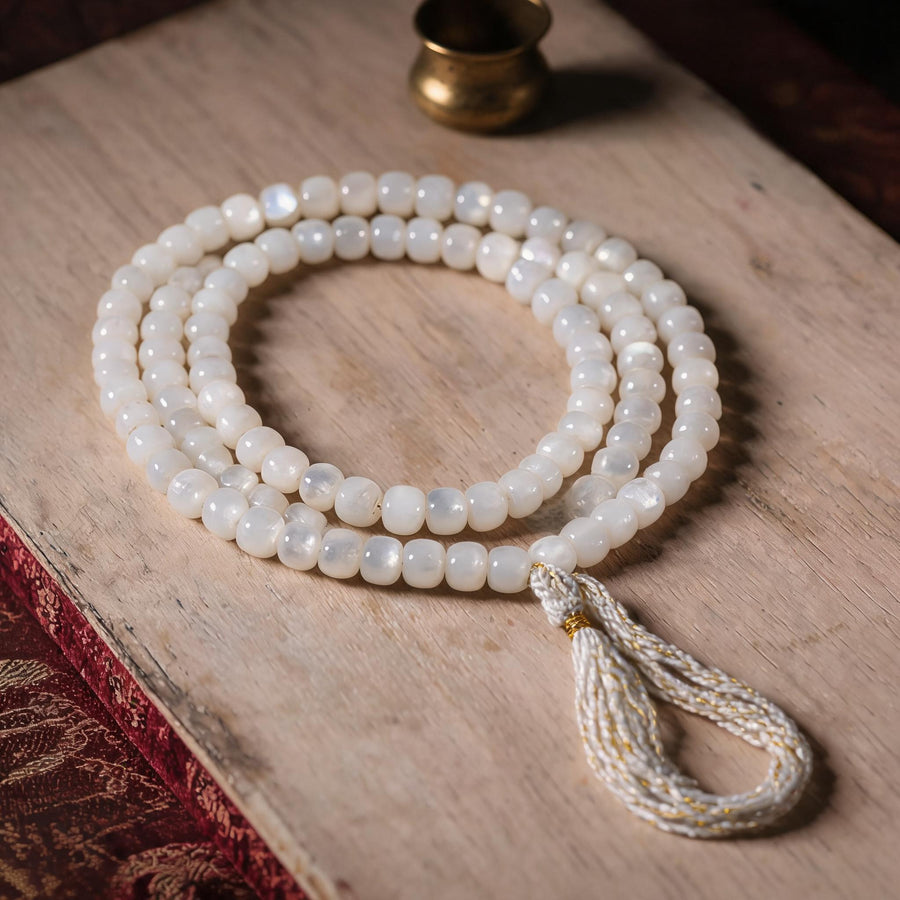 Handcrafted Mother-of-Pearl 108 & 27-Bead Mala Collection - Tibetan Spirit · 7×6 mm · 108 Beads · White-Gold Tassel - front hero view