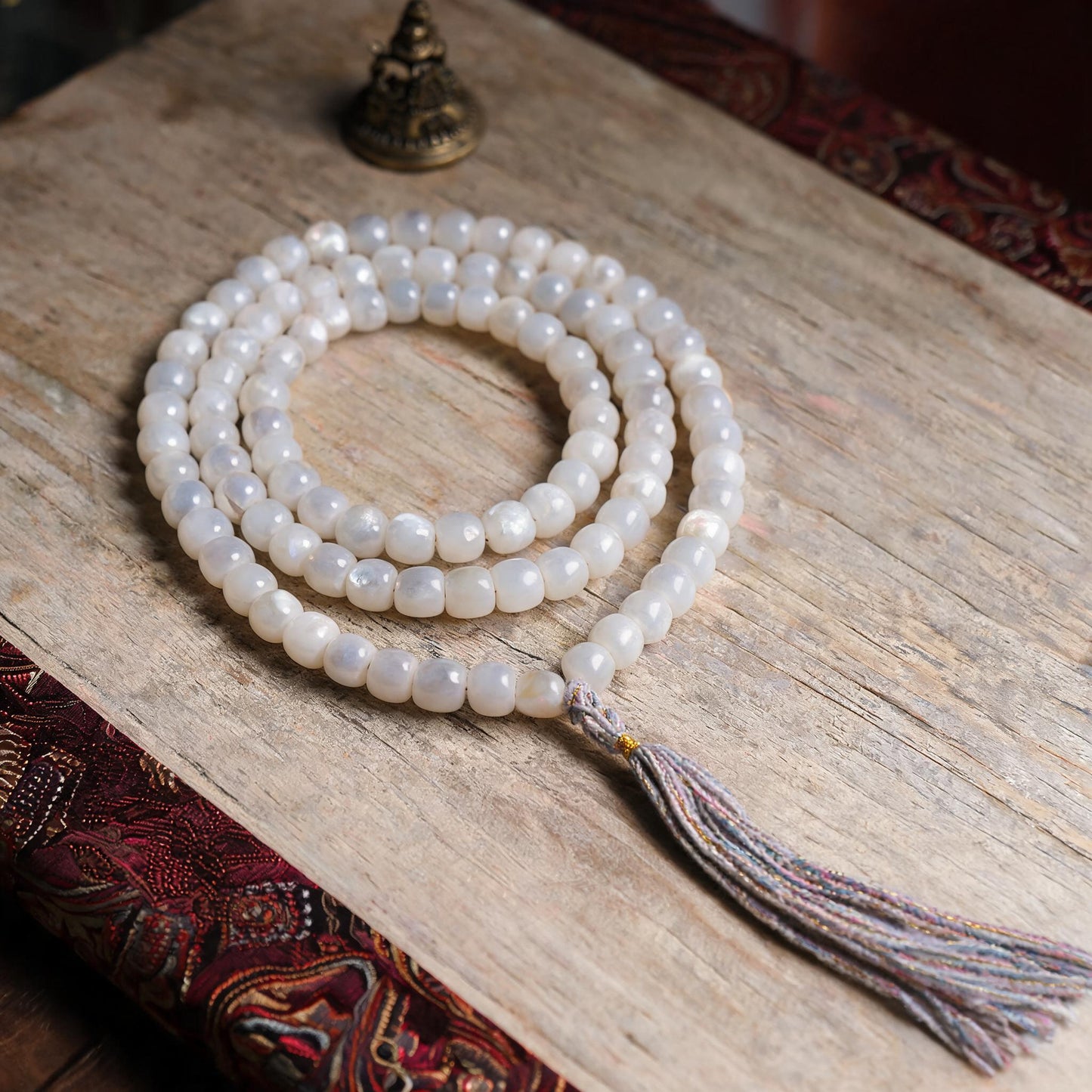 Handcrafted Mother-of-Pearl 108 & 27-Bead Mala Collection - Light of the Snowlands · 8×7 mm · 108 Beads · Multicolor-Gold Tassel - front hero view
