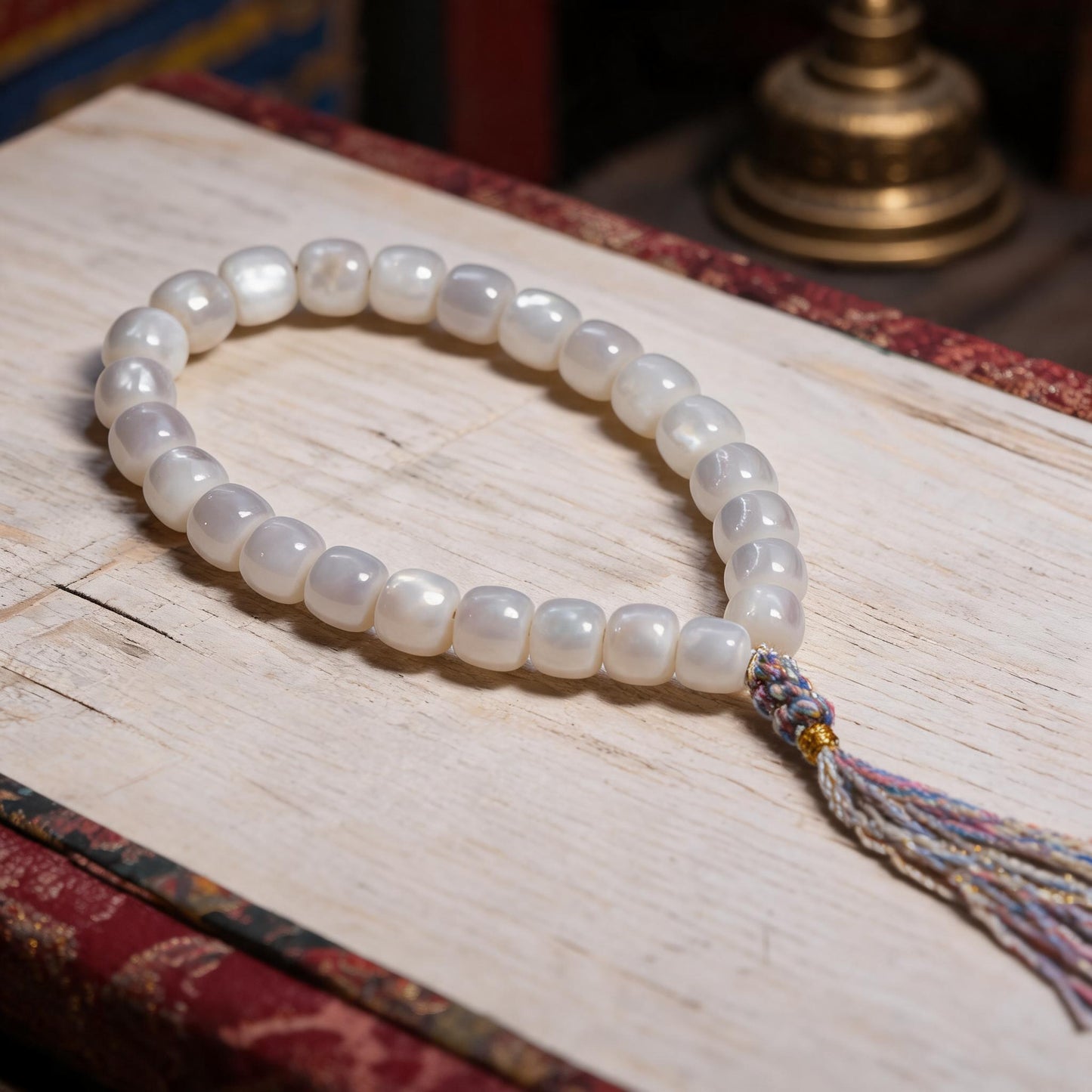 Handcrafted Mother-of-Pearl 108 & 27-Bead Mala Collection - Travel Hand Mala · 8×7 mm · 27 Beads · Multicolor-Gold Tassel - front hero view