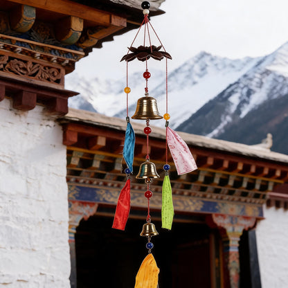 Tibetan wind chime with brass bells and prayer flags main hanging shot