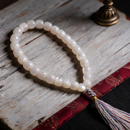 Handcrafted Mother-of-Pearl 108 & 27-Bead Mala Collection - Travel Hand Mala · 8×7 mm · 27 Beads · Multicolor-Gold Tassel - three-quarter view