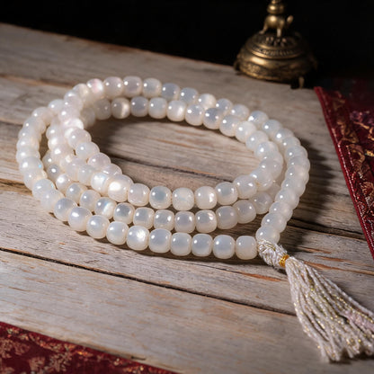 Handcrafted Mother-of-Pearl 108 & 27-Bead Mala Collection - Tibetan Spirit · 7×6 mm · 108 Beads · White-Gold Tassel - low side view