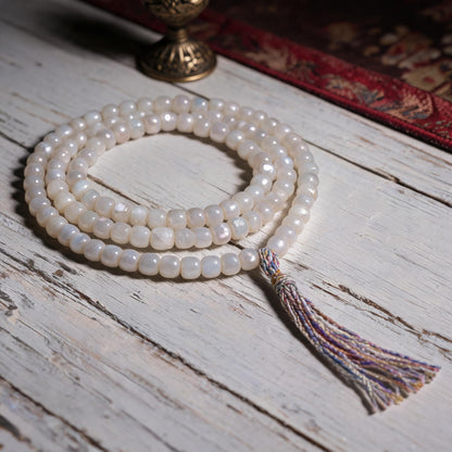 Handcrafted Mother-of-Pearl 108 & 27-Bead Mala Collection - Tibetan Spirit · 7×6 mm · 108 Beads · Multicolor-Gold Tassel - low side view