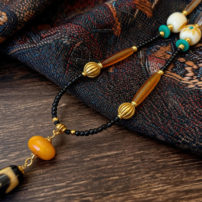 Kumbu dzi bead necklace chain materials detail