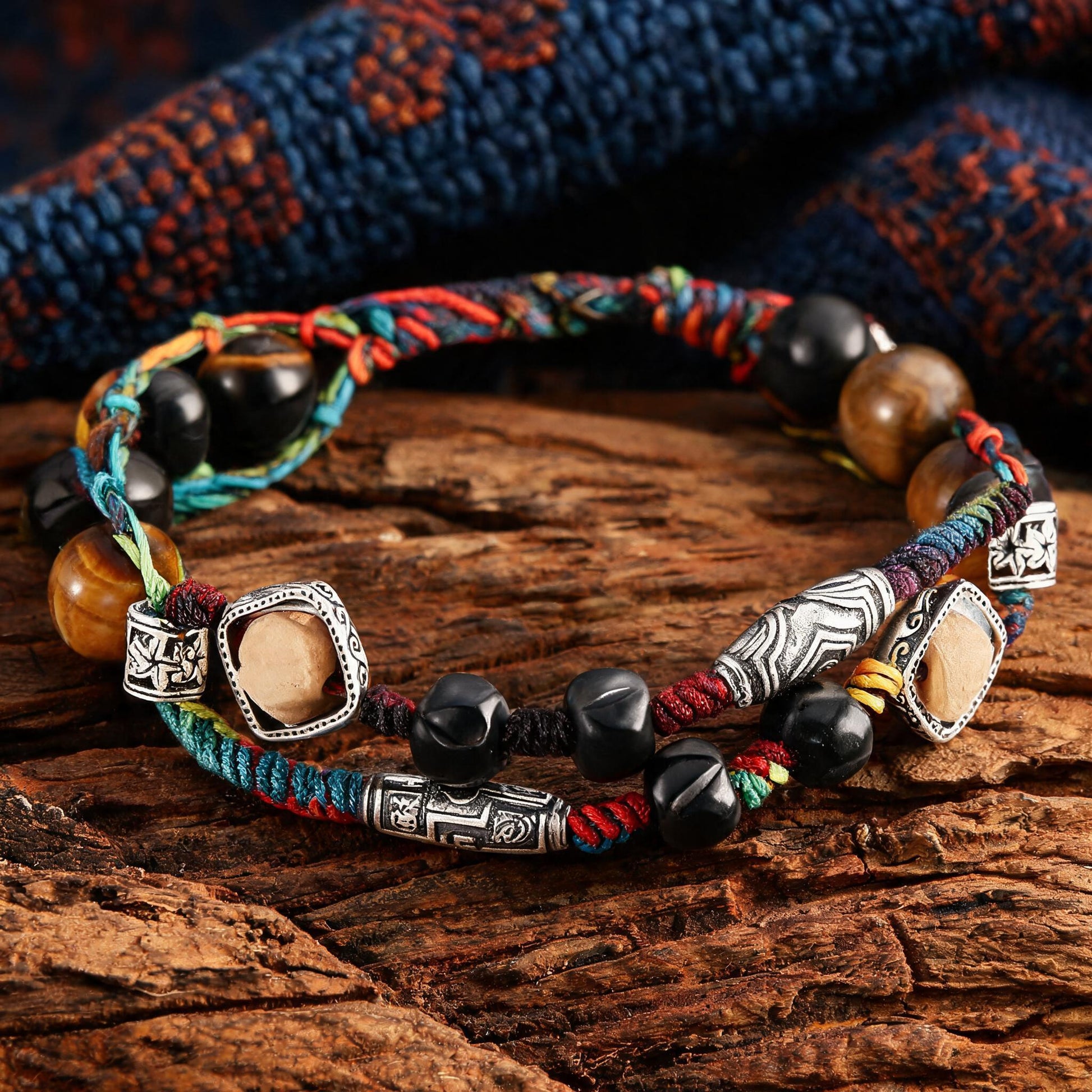 Hand-woven multicolor cord bracelet with stone-frame and silver-tone spacer detail