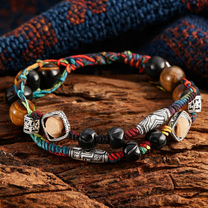 Hand-woven multicolor cord bracelet with stone-frame and silver-tone spacer detail