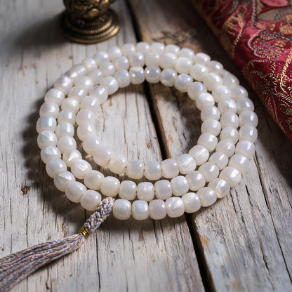 Handcrafted Mother-of-Pearl 108 & 27-Bead Mala Collection - Light of the Snowlands · 8×7 mm · 108 Beads · Multicolor-Gold Tassel - material and construction detail
