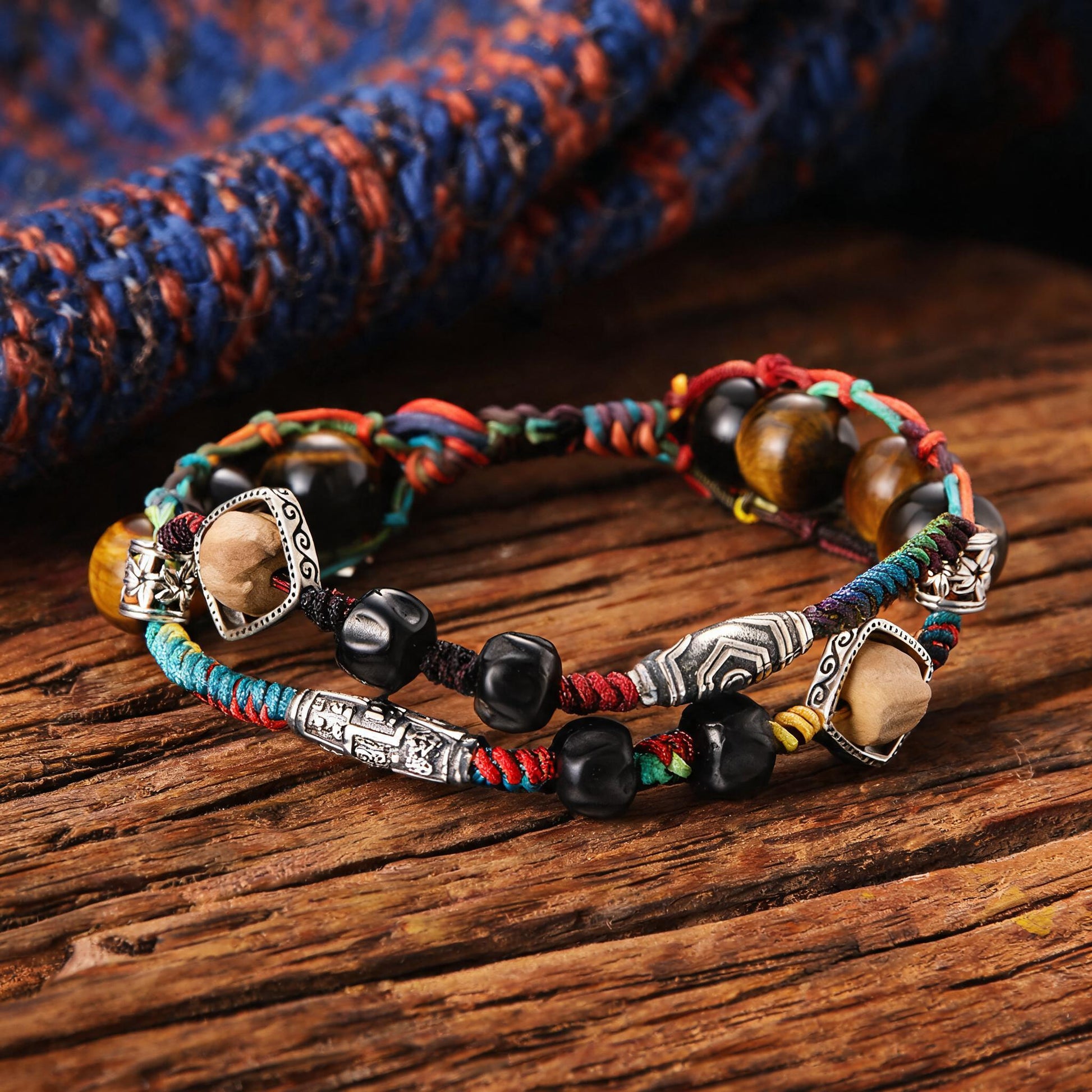 Hand-woven multicolor cord bracelet with adjustable braided cord detail