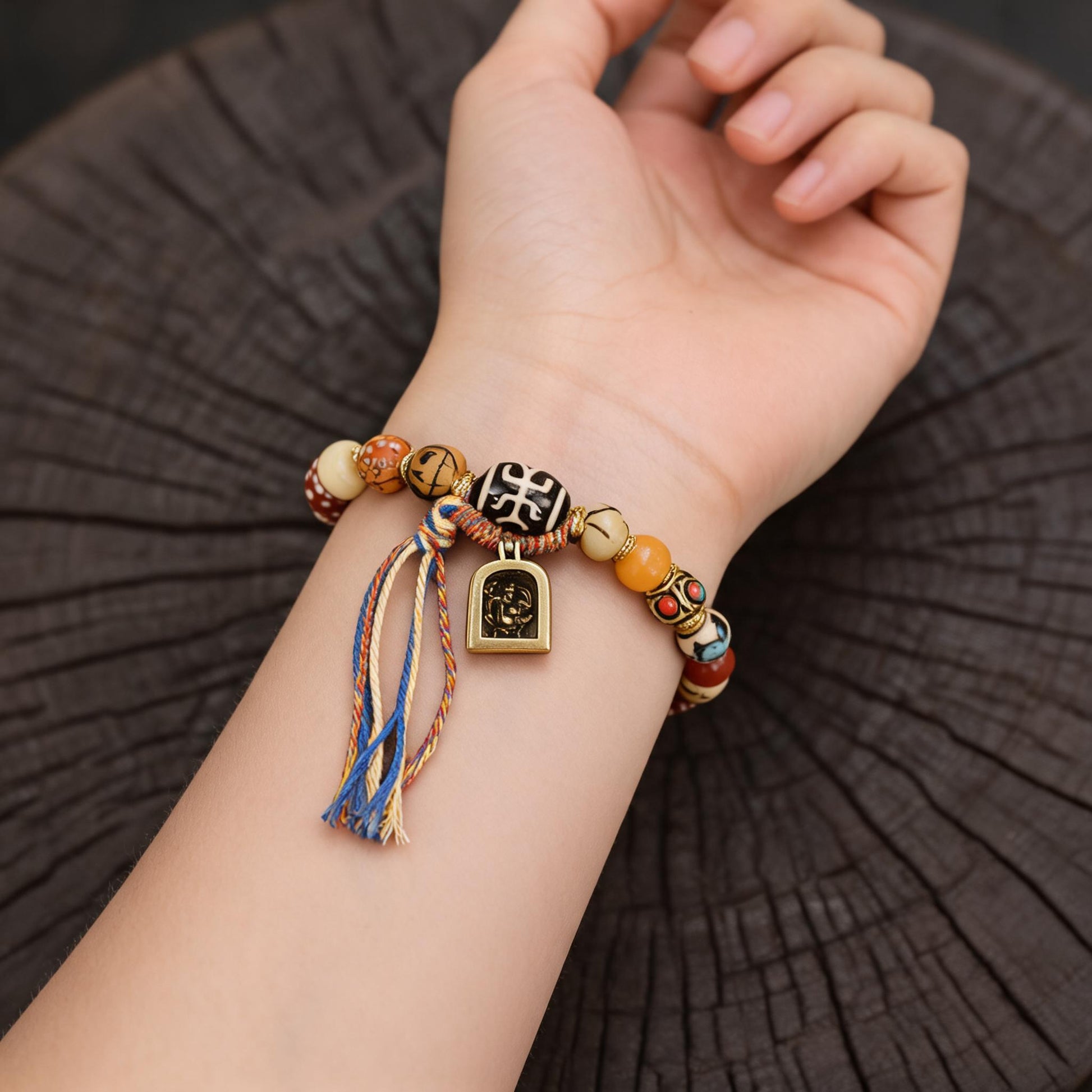 Tibetan dzi bone multi-treasure bracelet wrist wearing