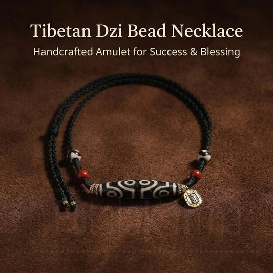 Eight eye and tiger tooth dzi necklace side view