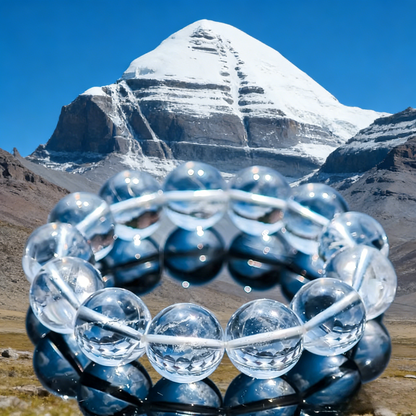 Clear quartz bead bracelet displayed before Mount Kailash