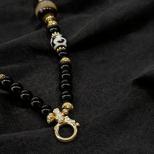 Design I dzi bead pendant detail close-up