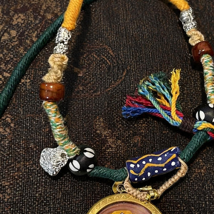 Zaki Lhamo thangka pendant bead and cord detail