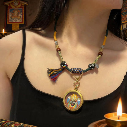 Zaki Lhamo thangka pendant necklace wearing shot