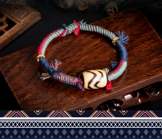 Tiger tooth dzi bead bracelet side view