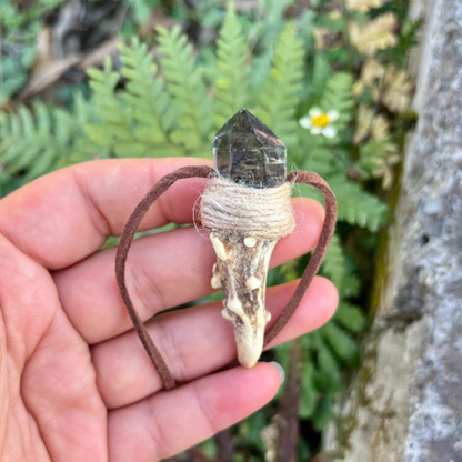 Handcrafted antler and crystal necklace close up
