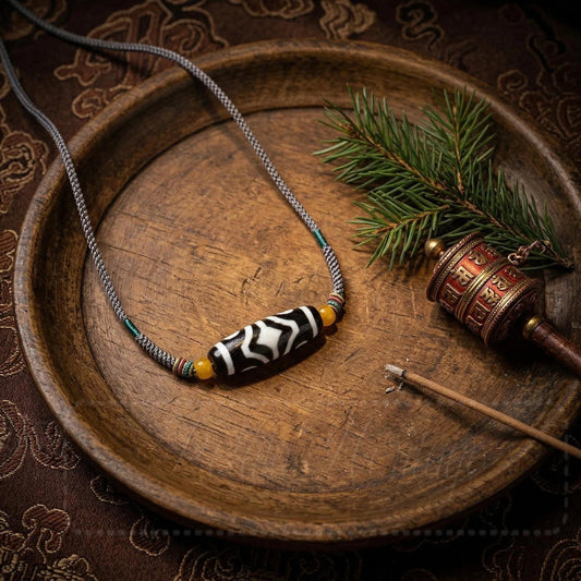 Four eye dzi bead necklace side view