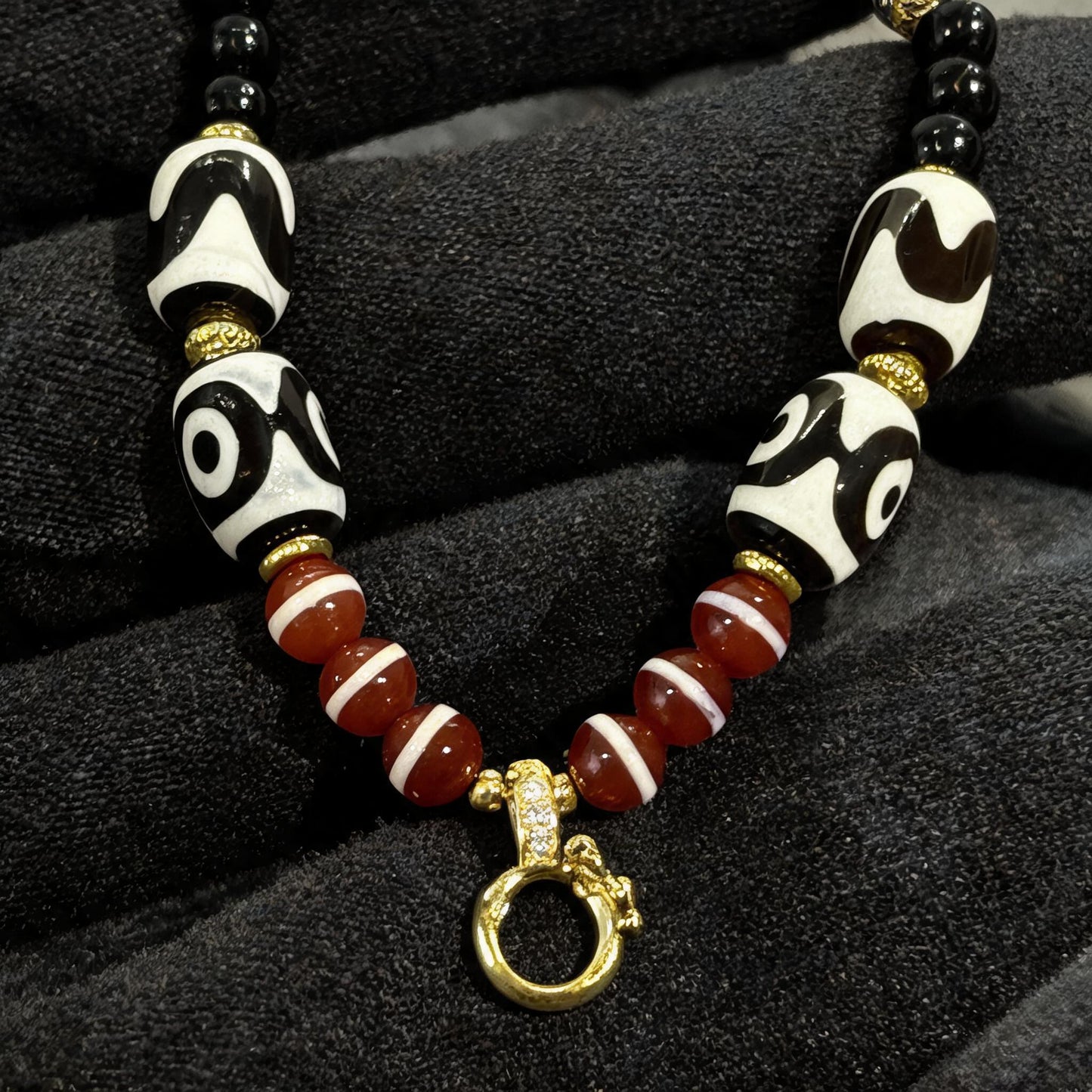 Design P dzi bead pendant detail close-up