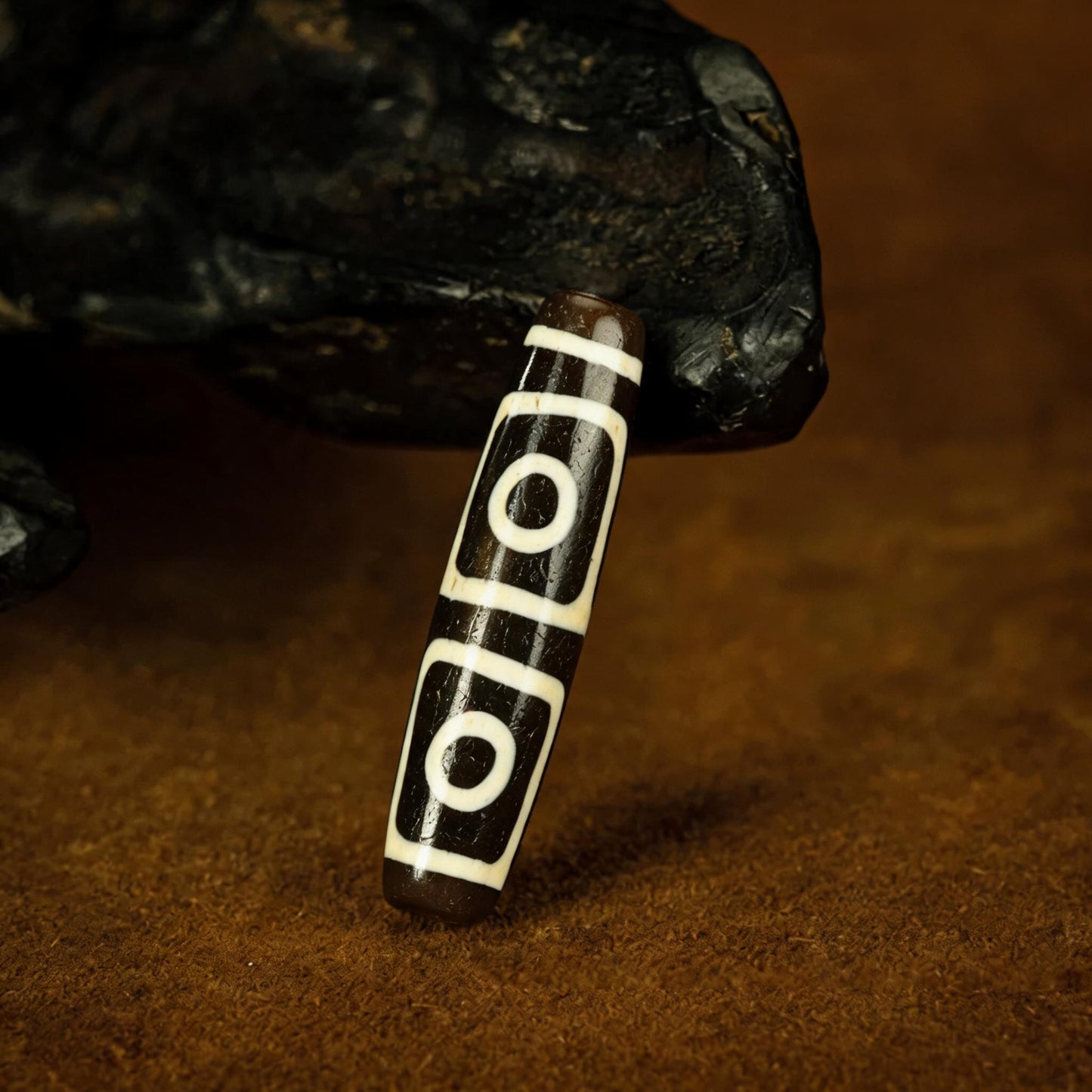 Millennium pure black and white four-eye Dzi bead collector documentation view 2