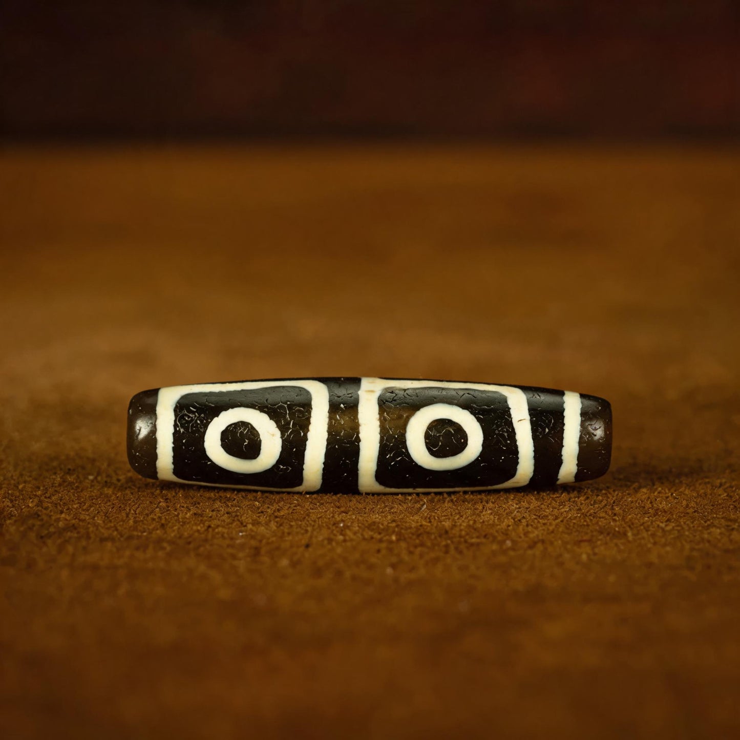 Millennium pure black and white four-eye Dzi bead collector documentation view 3