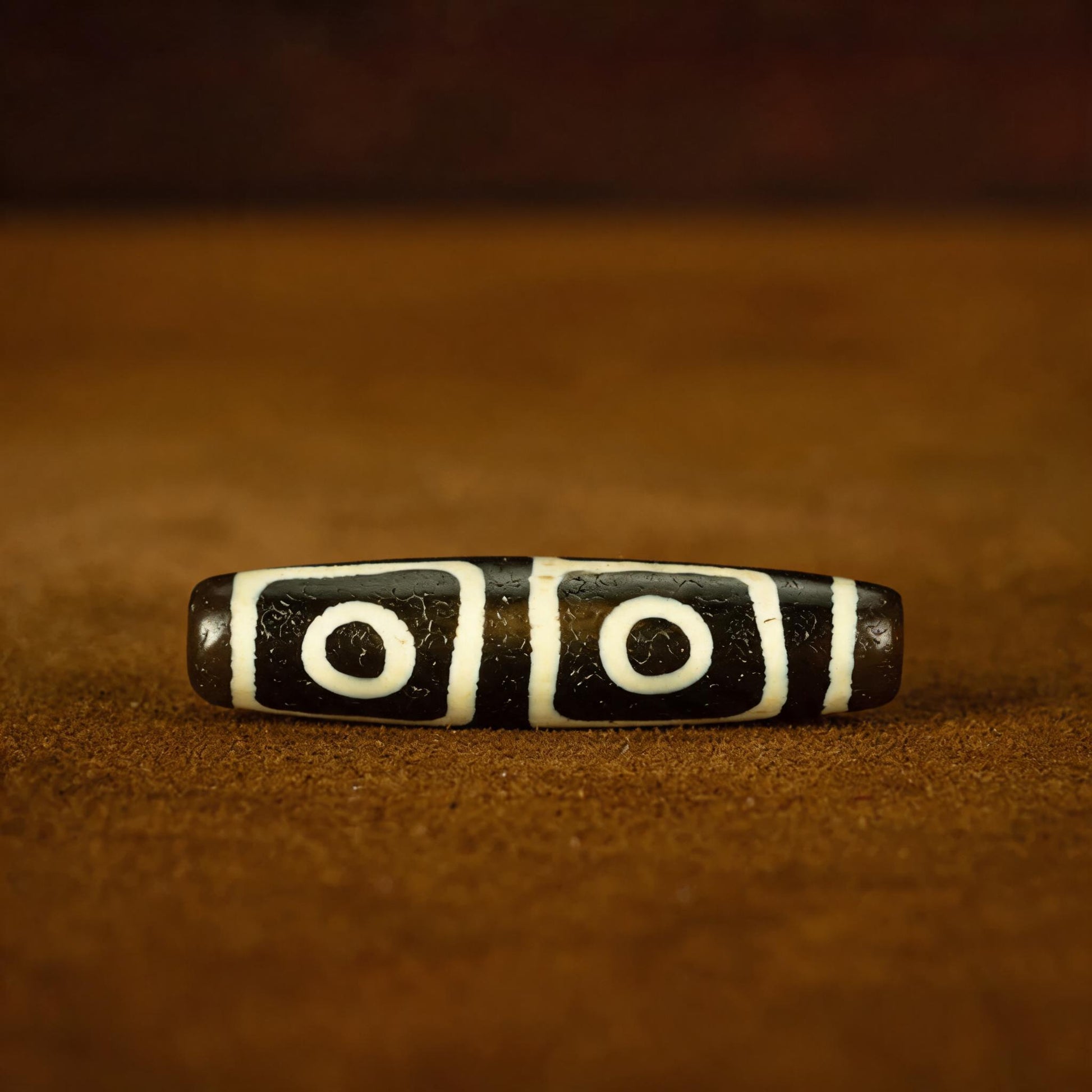 Millennium pure black and white four-eye Dzi bead collector documentation view 3