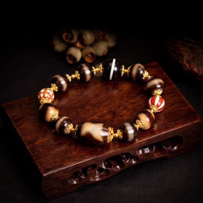 Handmade tiger tooth dzi bead braided bracelet main view