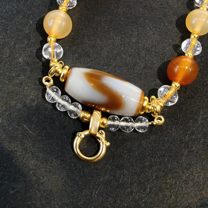 Design T dzi bead pendant detail close-up