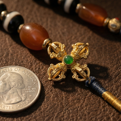 Three eye dzi bead close up