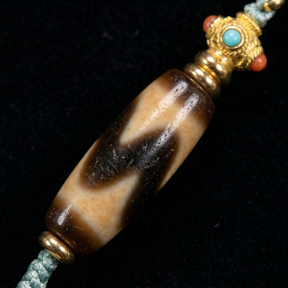 Dzi bead necklace close up