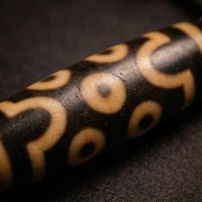 Agarwood and dzi bead necklace close up
