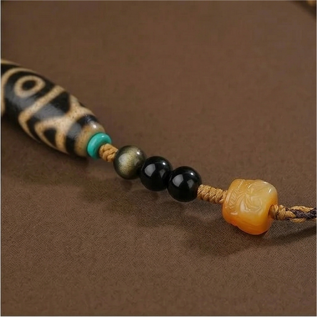 Three eye dzi bead necklace side view