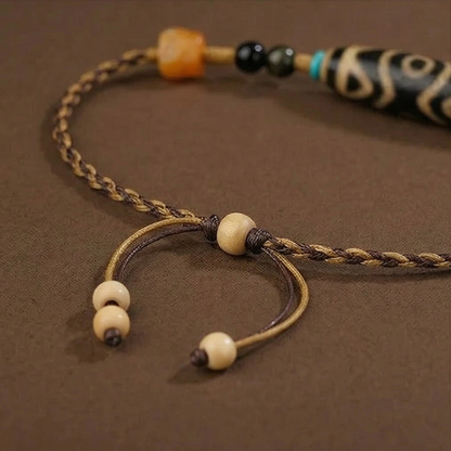Three eye dzi bead close up