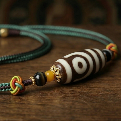 Ruyi two eye dzi bead close up