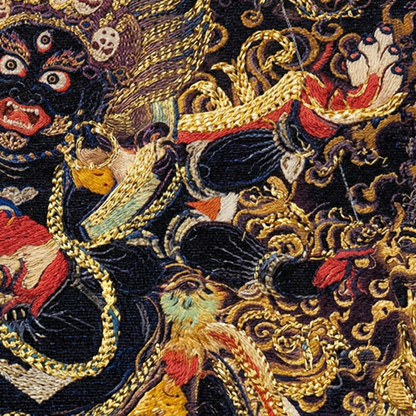Hand painted Six Armed Mahakala pendant close up