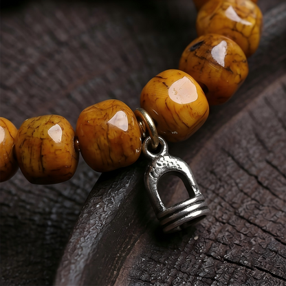 Hand carved yak bone bracelet bead detail