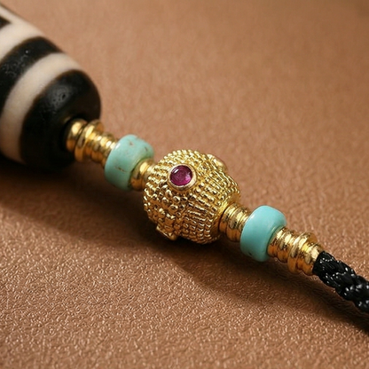 Liuli and dzi bead necklace close up