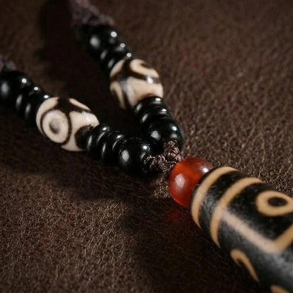 Tiger tooth dzi bead detail