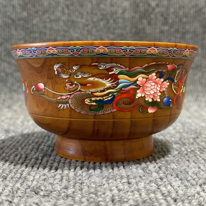 Hand painted yellow dragon motif bowl detail